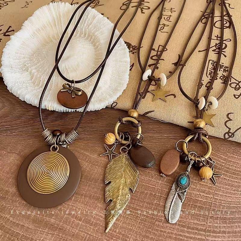 New Chinese Retro Long Sweater Chain Zen Feather Necklace for Women 2026 New Ethnic Style Stacked Accessories Autumn