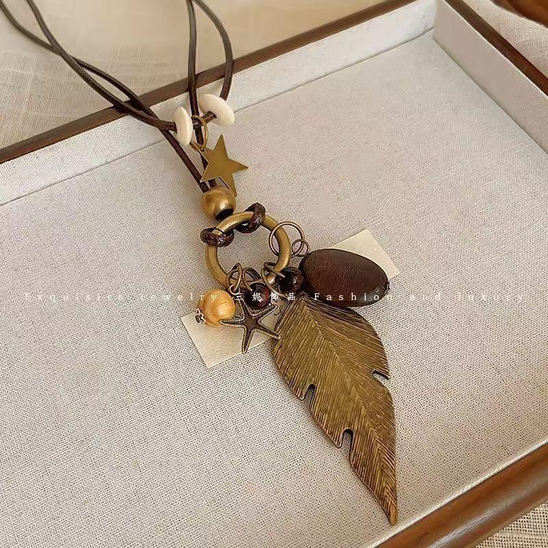 New Chinese Retro Long Sweater Chain Zen Feather Necklace for Women 2026 New Ethnic Style Stacked Accessories Autumn