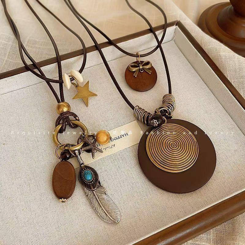 New Chinese Retro Long Sweater Chain Zen Feather Necklace for Women 2026 New Ethnic Style Stacked Accessories Autumn