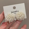 French Baroque Fireworks Pearl Stud Earrings 2024 New Elegant High Sense Niche Design Light Luxury Simple Earrings
