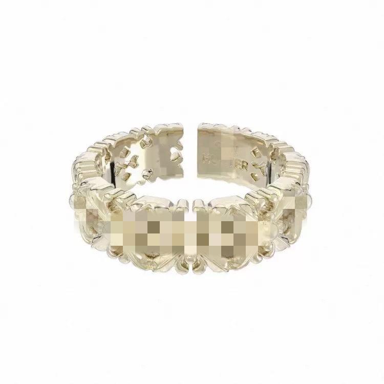 Three Horizontal Same Style Jewelry Iris Flower Ring Light Titanium Lace Hollow Cross Maillard Light Luxury Niche Wholesale